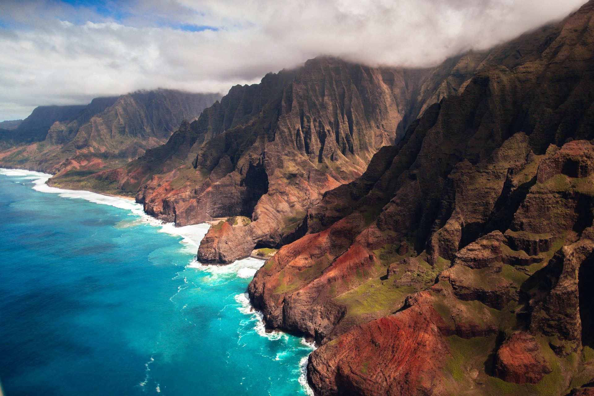 Na Pali Coast cliffs on Kauai's north shore, a popular day-trip destination (stock photo, not the property)