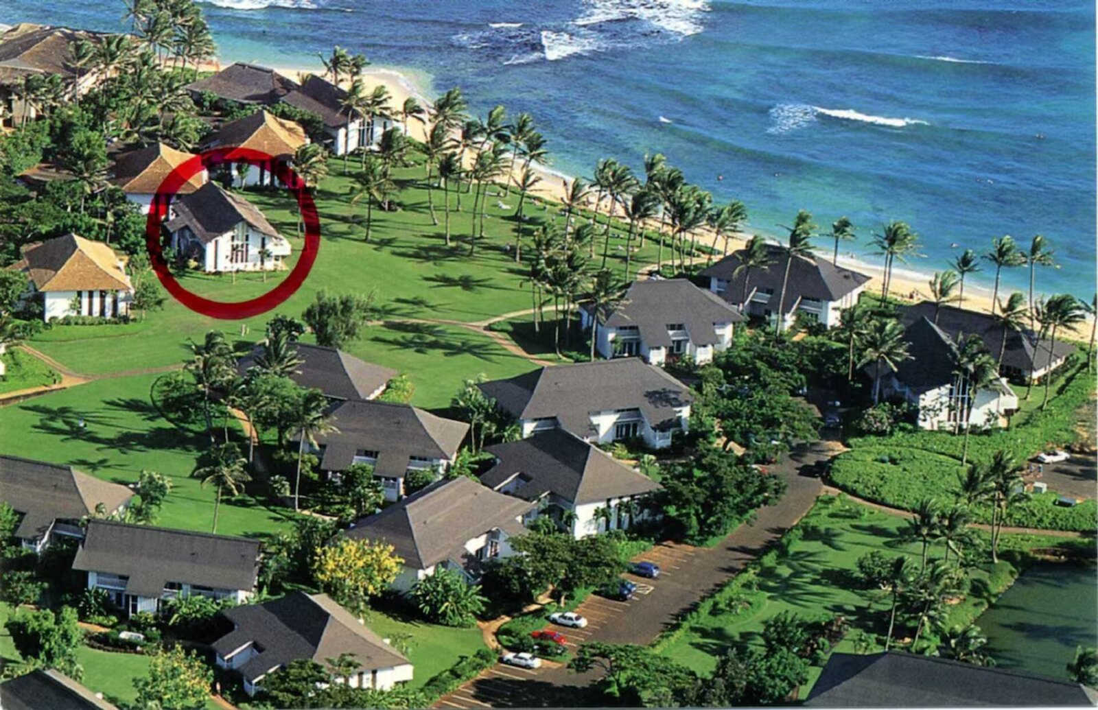 Aerial view of the Great Lawn fronting Poipu Beach with Condo #22 circled in red